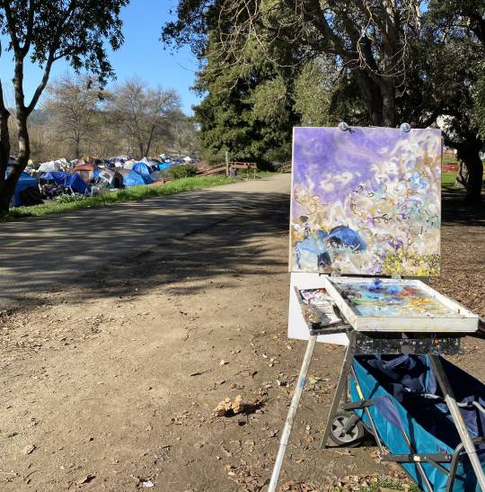 purple painting in process at Benchlands encampment for the unhoused